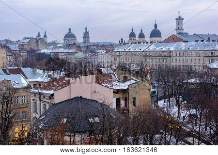Evening Lviv. View of the central part of the city and churches: St. Michael's Ukrainian Catholic Church Church of the Holy Communion Korniakt Tower Armenian cathedral Transfiguration Church Lviv city council.