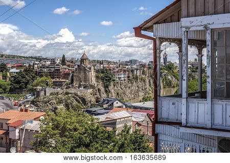Tbilisi capital of Georgia . Famous throughout the world Tbilisi balconies in the Old Town .View of the left bank of the Kura River in the district of Avlabari .