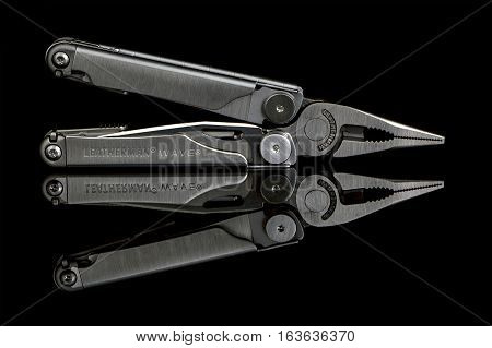 SWINDON UK - DECEMBER 30 2016: Leatherman Wave multitool on a black background