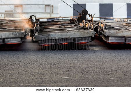 Serface Heater Machine Working On Asphalt Road