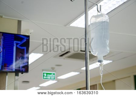 Close up saline IV drip for patient and Infusion pump in hospital