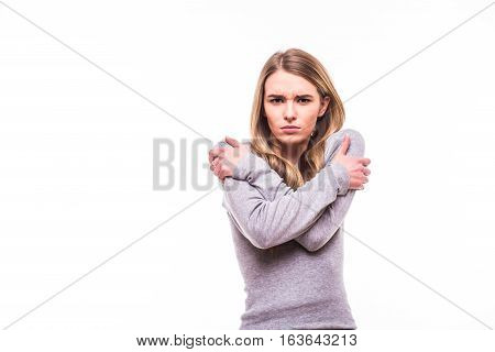 Young Blonde Girl With Get Cold Gesture On White Background