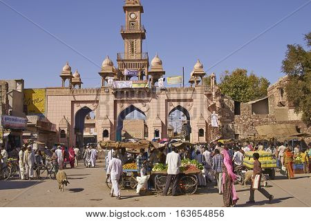 NAGAUR, RAJASTHAN, INDIA - FEBRUARY 16, 2008: Busy market outside main gateway to the historic fort in Nagaur, India.