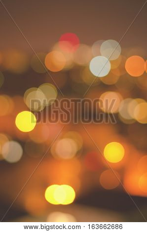 Christmas background. Festive abstract holidaysbackground with bokeh defocused lights and stars, vertical