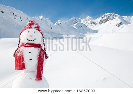 Happy snowman in mountain (copy space)