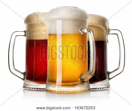 Glass mugs of beer isolated on a white background