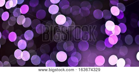 Christmas background. Festive abstract holidaysbackground with bokeh defocused lights and stars. Purple, lilac, violet color, toned