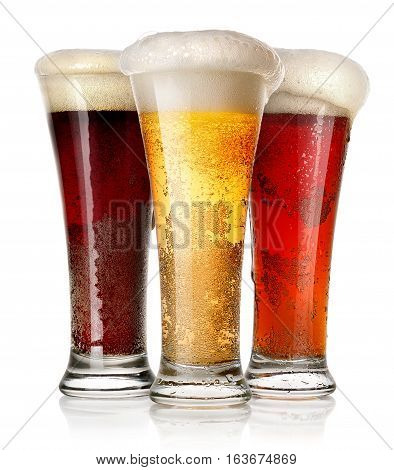 Tall glasses of beer isolated on a white background