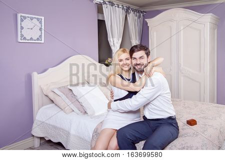 Handsome man doing a marriage proposal while offering his wife an engagement ring. Boyfriend make a marriage proposal to his girlfriend in valentine days.