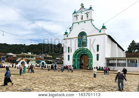 San Juan Chamula - May 11 2014: Local people in front of the Church of San Juan in the town of San Juan Chamula Chiapas Mexico