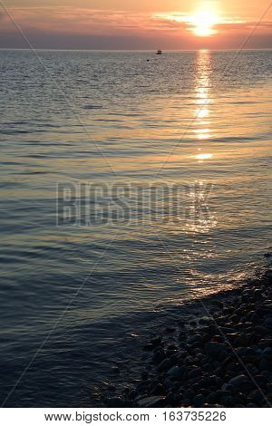 Sunset over the sea in the Bay of Imereti. Sochi Russia