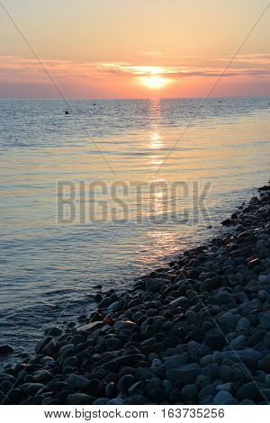 Sunset over the sea in the Bay of Imereti. Sochi Russia