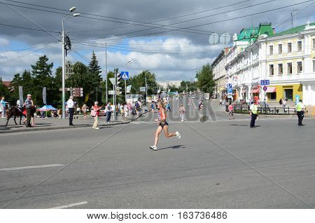 OMSK RUSSIA - AUGUST 7: Marathon runners in action at the Siberian International Marathon on August 7 2016 in Omsk.
