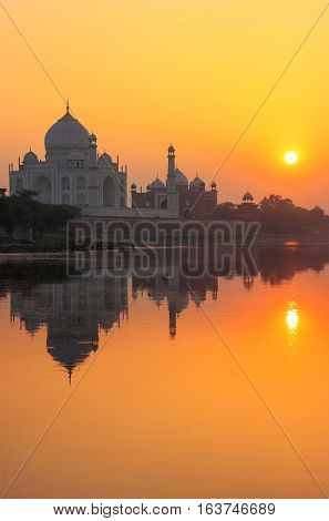 Taj Mahal Reflected In Yamuna River At Sunset In Agra, India