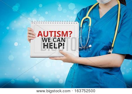 Doctor Shows Autism? We Can Help! Text On White Line Paper Book.