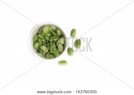 Parkia speciosa in cup on white background ( bean petai twisted cluster stink bitter sato )