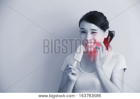 woman have sensitive teeth with ice asian