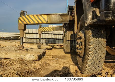 Mobile truck-mounted crane operating at construction site