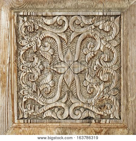 Close-up of a traditional carved wooden door, Uzbekistan
