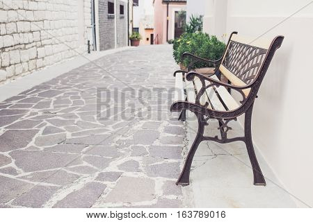 Old Street Of Stone Houses With Bench In Numana