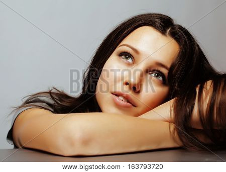 young pretty taned girl close up portrait smiling confident brunette warm, lifestyle people concept close up