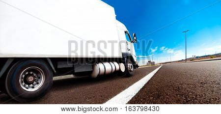 Truck and transport. Lorry delivering freight by road or highway
