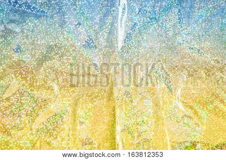 A Glitter lights gold abstract christmas background.