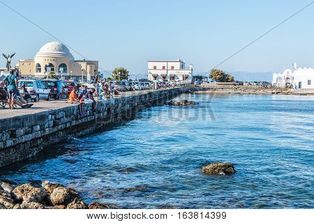 RHODES, GREECE-SEPTEMBER 23, 2016: Beautiful historical Mandraki Harbor of Island of Rhodes, Greece