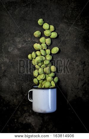 Wasabi Peanuts On Black Background