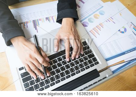 Business Woman's Hands Typing On Laptop Keyboard