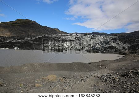 Solheimajokull Glacier with dark ice in Iceland