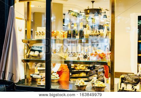 STRASBOURG FRANCE - DEC 20 2016: Paul Boulangerie Et Patisserie cafe with window shopping full of pastries sweets and champagne. Paul is a French chain of bakery/cafe restaurants established in 1889 in the city of Croix in Northern France