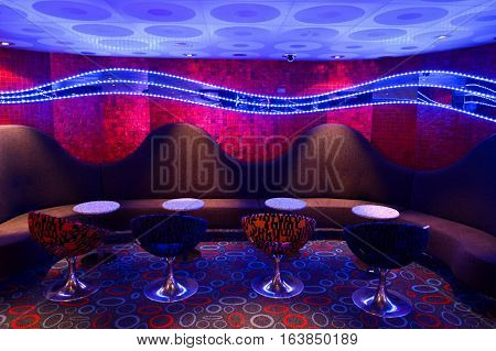 Bar tables and bar stools in natural light