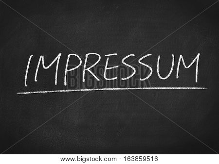 impressum concept word on blackboard chalkboard background
