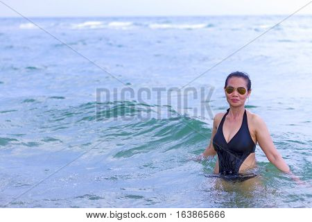 Lady on water in Ban Krut Beach at Prachuap Khirikhun Province Thailand