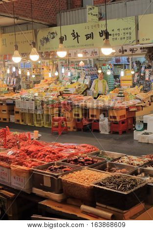 SEOUL SOUTH KOREA - OCTOBER 21, 2016: Unidentified people work at Gwangjang market. Gwangjang market is one of the oldest and largest traditional markets in South Korea with more than 5000 shops.