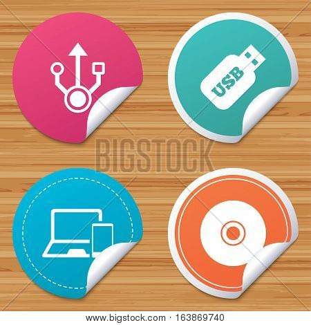 Round stickers or website banners. Usb flash drive icons. Notebook or Laptop pc symbols. Smartphone device. CD or DVD sign. Compact disc. Circle badges with bended corner. Vector