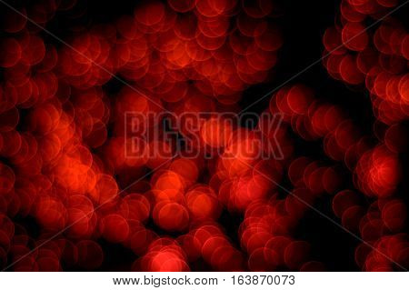 Bokeh lens effect of red circular lights