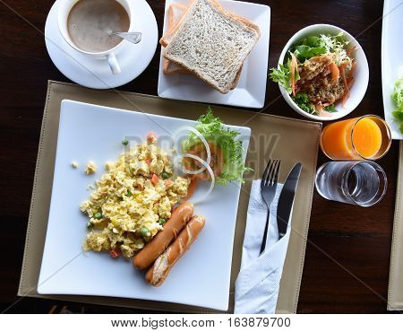 Happy Family Having Breakfast on the tabke