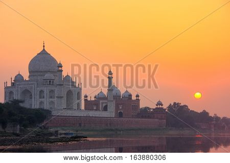 Taj Mahal Reflected In Yamuna River At Sunset In Agra, India