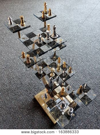 Three-dimensional Transparent Chess Set with Gold and Silver Pieces