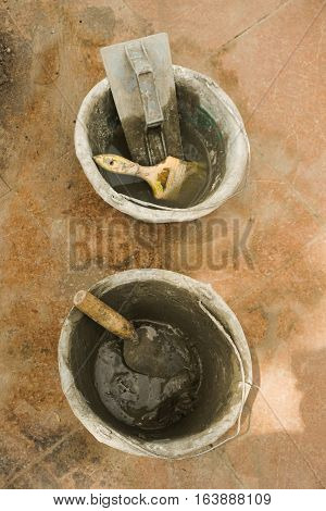 Cement mix prepared for covering brick wall photo taken in Semarang Indonesia java
