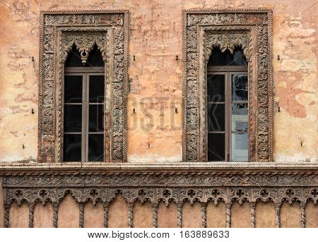 Old window in palace on Piazza Sordello The historic city center of Mantova Lombardy .Italy