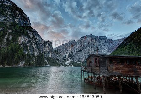 Hut on Braies lake and Dolomiti on sunrise Trentino Alto Adige Italy