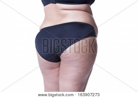 Fat female body with cellulite fatty hips and buttocks isolated on white background