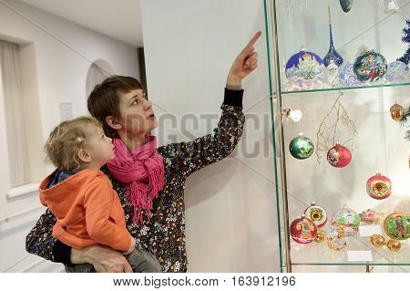 Woman With Kid In Museum