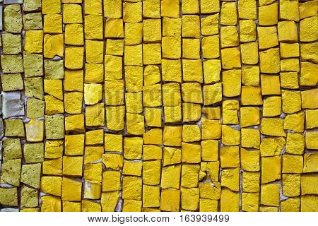 Yellow old smalt mosaic rustic surface background