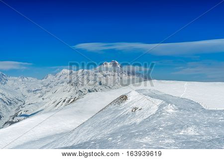 Winter in Greater Caucasus Mountains. Georgia (country). Gudauri ski resort. View from Mt. Sadzele.