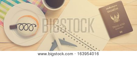 Travel blogger in coffee shop working space.