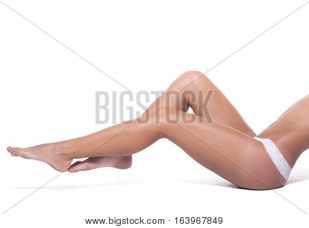 Perfect female legs on a white background.